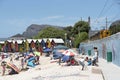 St James beach and colourful beach huts and train. Cape Town South Africa