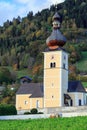 St. John Church in the fall. Alpine village Obermillstatt, Austria Royalty Free Stock Photo