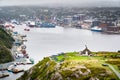 Harbour view with historic cannons overlooking The Narrows from the Signal Hill Battery. Royalty Free Stock Photo