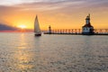St. Joseph Lighthouse and Sailboat Solstice Sundown Royalty Free Stock Photo