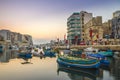 St.Julian`s, Malta - Traditional colorful Luzzu fishing boats Royalty Free Stock Photo