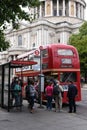 21st June 2015: People Boarding on Iconic Old Style Red Bus at Saint Paul Cathedral Bus Station