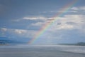 St. Lawrence River Landscape, Quebec Canada. On a cloudy day, with rainbows in the background. Concept of meteorology and nature