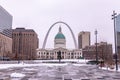 View of an old courthouse with Gateway Arch behind on a snow winter day Royalty Free Stock Photo