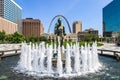 The Runner statue in front of the Courthouse and Gateway Arch in St. Louis, MO