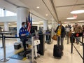 People walking through the security line at St. Louis, MO Lambert International Airport STL