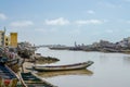 St Louis, Senegal - October 12, 2014: Colorful painted wooden fishing boats or pirogues at coast of St. Louis