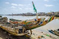 St Louis, Senegal - October 12, 2014: Colorful painted wooden fishing boats or pirogues at coast of St. Louis