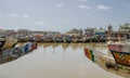 St Louis, Senegal - October 12, 2014: Colorful painted wooden fishing boats or pirogues at coast of St. Louis