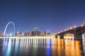 St. louis skyscraper at night with reflection in river,st. louis,missouri,usa