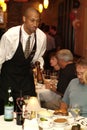 ST. LOUIS, UNITED STATES - Dec 23, 2008: Waiter taking order in a restaurant