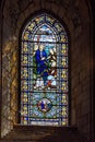 Beautiful stained glass windows in the 12th century Gothic cathedral of St Magnus in Kirkwall, Orkney, UK Royalty Free Stock Photo