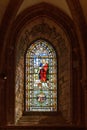 Beautiful stained glass windows in the 12th century Gothic cathedral of St Magnus in Kirkwall, Orkney, UK Royalty Free Stock Photo