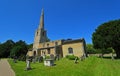 St Margarets church at Hemmingford Abbots Cambridgeshire England blue sky and grave stones. Royalty Free Stock Photo