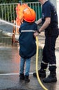 french rescue man with child demonstration