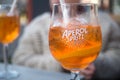 Glass of Aperol spritz on restaurant terrace