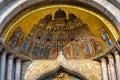 St Mark`s Basilica close-up, Venice, Italy. It is top landmark in Venice. Beautiful golden mosaic portal, image of ancient Mark Royalty Free Stock Photo