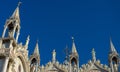 St Mark`s Basilica or San Marco, detail of facade top on blue sky background, Venice, Italy Royalty Free Stock Photo