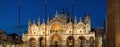 St Mark`s basilica or San Marco at night, Venice, Italy. Medieval basilica is top landmark of Venice. Panoramic view of facade