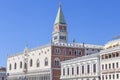 St Mark`s Campanile Campanile di San Marco and Doge`s Palace Palazzo Ducale on a background of blue sky, Venice, Italy Royalty Free Stock Photo