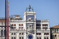 St Mark\'s Clock tower on Piazza San Marco, Lion of Saint Mark relief on facade, Venice, Italy