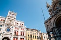 St Mark`s Clock tower Torre dell`Orologio and Basilica di San Marco in Piazza San Marco, Venice, Italy Royalty Free Stock Photo