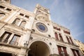 St Mark`s Clock Tower in Venice on Piazza San Marco. Royalty Free Stock Photo