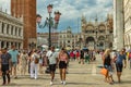 St. Mark Square, VENICE, ITALY - August 02, 2019: Loggetta del Sansovino museum, Torre dell Orologio, Basilica and Museum San Royalty Free Stock Photo