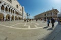 St. Mark Square, VENICE, ITALY - August 02, 2019: Torre dell Orologio, Basilica and Museum San Marco Locals and tourists strolling Royalty Free Stock Photo