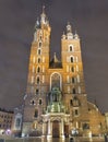 St. Mary gothic church facade at night in Krakow, Poland Royalty Free Stock Photo