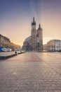 Krakow old town, Market square with St. Mary`s church at sunrise, historical center cityscape, Poland, Europe Royalty Free Stock Photo