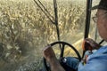 St. Mary`s, Missouri, USA, September 15, 2020 - Farmer driving harvester combine in farm corn field