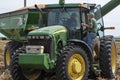 St. Mary`s, Missouri, USA, September 15, 2020 - Farmer talking to another farmer in tractor in farm corn field