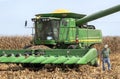 St. Mary`s, Missouri, USA, September 15, 2020 - Farmer walking from harvester combine in farm corn field