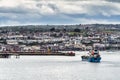 View of a ship approaching Falmouth harbour as seen from St Mawes, Cornwall on May 12, 2021