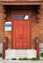1st of May 2016, Russia, Tomsk, wooden door of restored wooden house