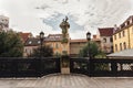 St Michael`s Bridge, Statue of John Nepomuk and Michaels gate to Royalty Free Stock Photo