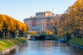 St. Michael`s Castle Mikhailovsky Castle or Engineers` Castle and Lebyazhya Kanavka canal in autumn, Saint Petersburg, Russia