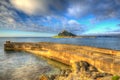 St Michaels Mount Cornwall England UK cloudscape medieval castle and church in colourful HDR Royalty Free Stock Photo