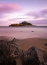 St. Michaels Mount with rocks at dusk, Cornwall Royalty Free Stock Photo