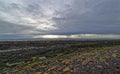 The St Monan\'s shingle beach at low tide on a wet day in January