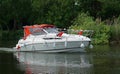 River Cruiser pleasure Craft on the river Ouse in Cambridgeshire