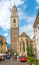 St.Nicholas church with bell tower in Merano. Royalty Free Stock Photo