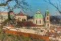 St Nicholas church with dome and a clock tower standing on Lesser Town Square Royalty Free Stock Photo