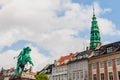 View of St Nicholas church tower and statue of Bishop Absalon, Copenhagen, Denmark