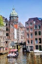 St Nicolaas Church and Zeedijk Chanel Houses Amsterdam in the spring Royalty Free Stock Photo