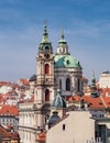 St. Nicolas church and roofs in Mala Strana district in Prague, Czech Republic