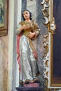 St. Notburga statue on the altar of St. Anthony the Hermit at the Church of the Visitation in Gornji Draganec, Croatia
