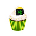 St Patrick cupcake with cauldron isolated on white background.