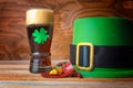 St.Patrick concept with green leprechaun hat, beer and gold Royalty Free Stock Photo